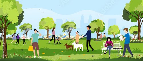Morning city park with happy family having fun,girl walking the dog, young boy talking on phone,man reading news paper and women sitting on bench reading a book,City lifestyle of people in Summer time