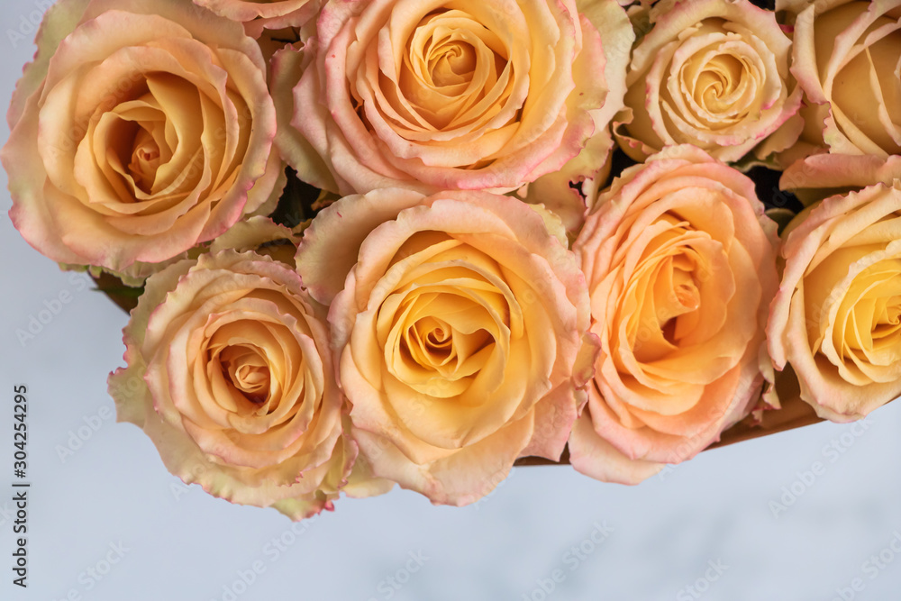 Roses of delicate color in a bouquet. Copy space. Top view. Close Up. Roses of delicate color in a bouquet. Copy space. Top view. Close Up.