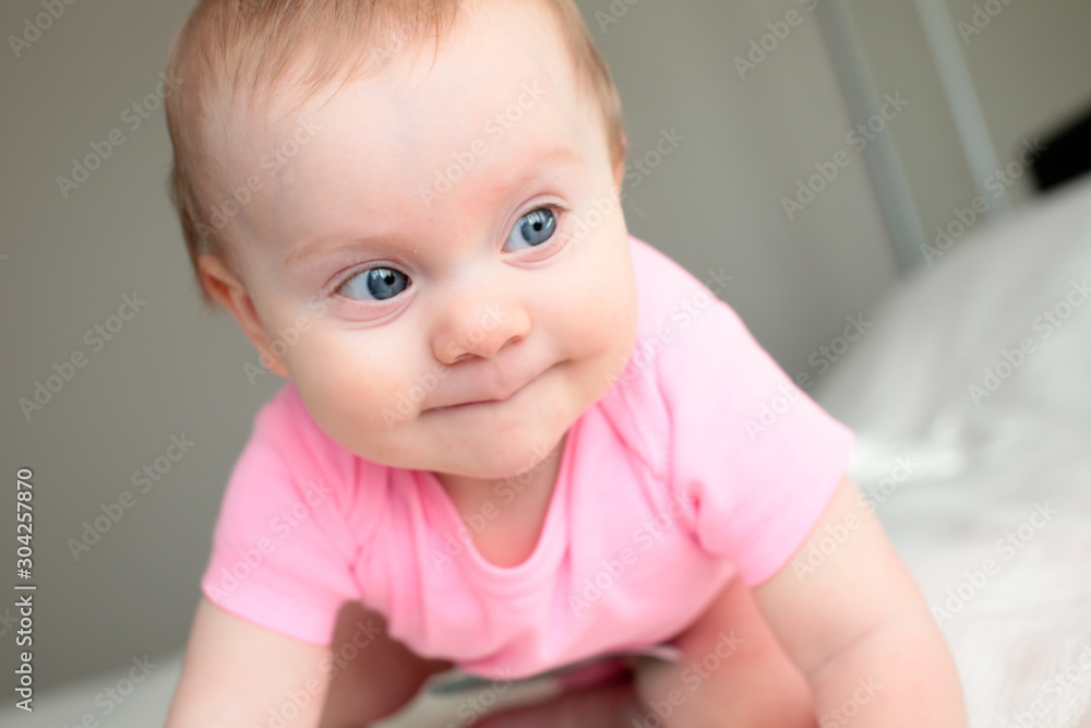Close up Portrait of Cute 8 Month Old baby Girl with Big blue Eyes, Happy Baby Girl Close up Portrait of Cute 8 Month Old baby Girl with Big blue Eyes, Happy Baby Girl
