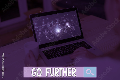 Text sign showing Go Further. Business photo text To make a bolder statement about something being discussed photo