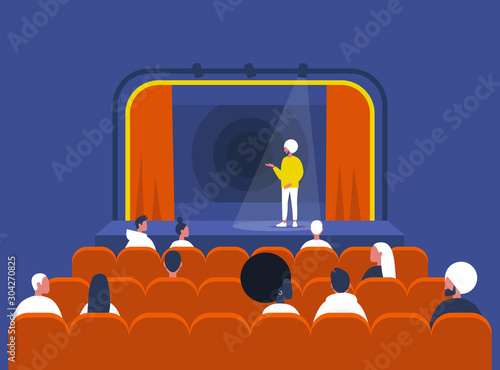 Entertainment and culture, Stand up comedy show, Young indian male artist performing on stage and Audience sitting in a vintage theatre with old fashion interior