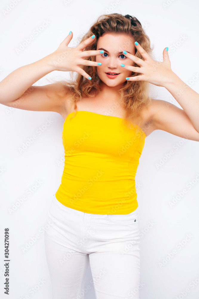 young pretty blond girl posing happy smiling on white background isolated, lifestyle people concept young pretty blond girl posing happy smiling on white background isolated, lifestyle people concept