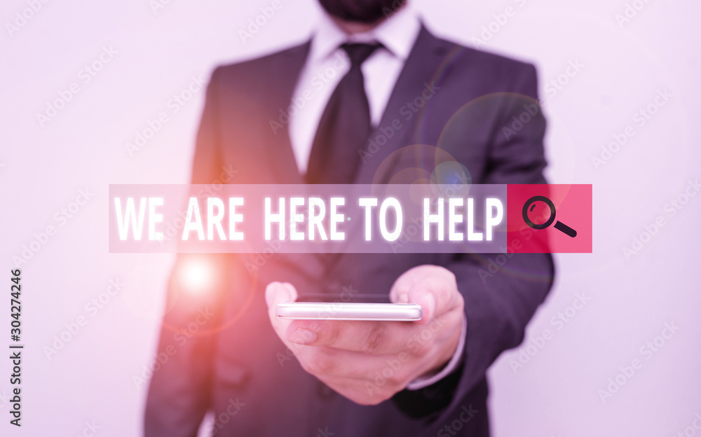 Word writing text We Are Here To Help. Business photo showcasing Someone who is always ready to Assist Support Give Male human wear formal work suit hold smart hi tech smartphone use one hand Word writing text We Are Here To Help. Business photo showcasing Someone who is always ready to Assist Support Give Male human wear formal work suit hold smart hi tech smartphone use one hand