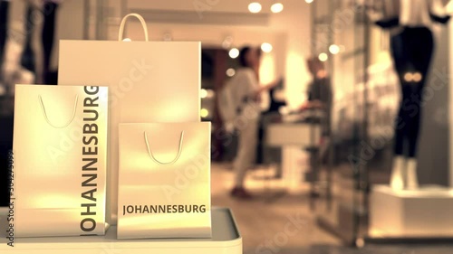 Paper bags with Johannesburg text. Shopping in South Africa related 3D animation photo