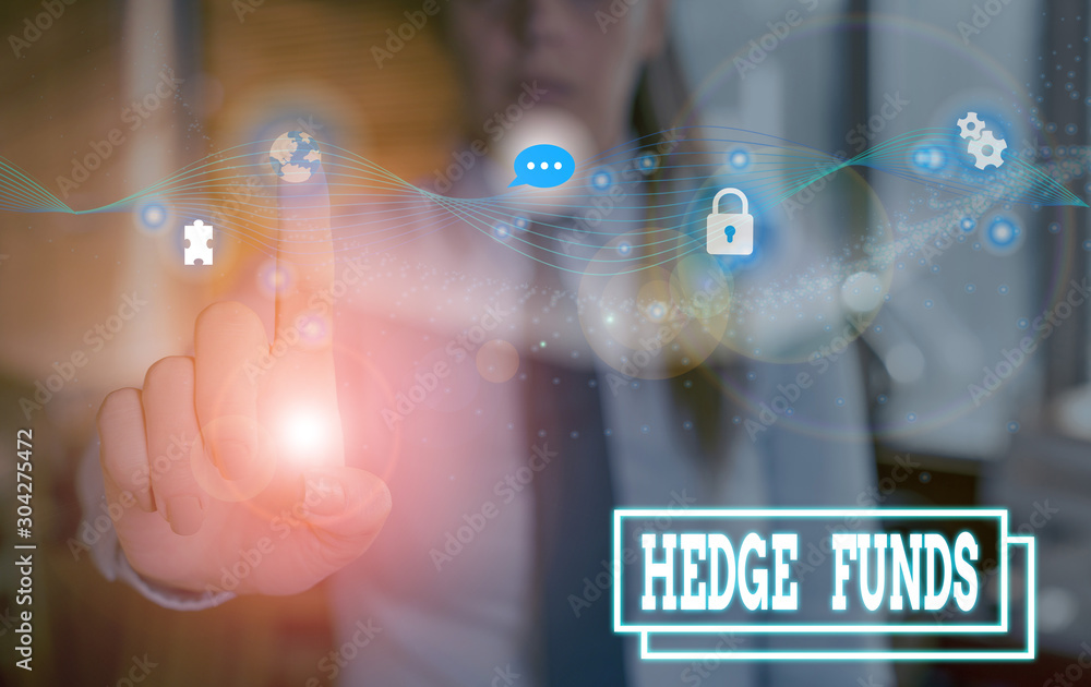 Writing note showing Hedge Funds. Business concept for basically a fancy name for an alternative investment partnership Writing note showing Hedge Funds. Business concept for basically a fancy name for an alternative investment partnership