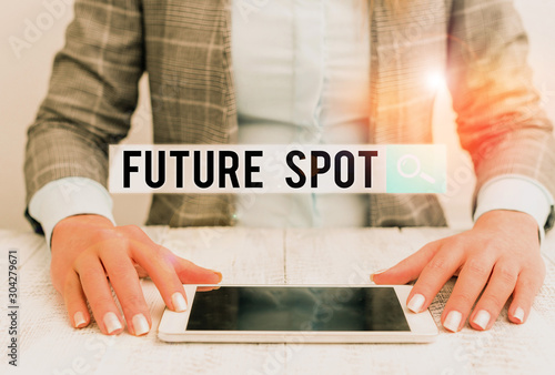 Handwriting text Futuro Spot. Conceptual photo refers to an action that will take place in the future Business woman sitting with mobile phone on the table