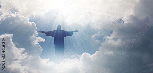 Carta da parati Jesus appeared bright in the sky and Christian Cross with soft fluffy clouds, white and beautiful with the light shining as hope, love and freedom in the sky background