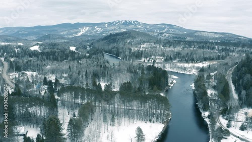 Winter Landscape - Drone Flying Zoom In  - 4K - Mountains - Mont Tremblant sequence 002/012 photo