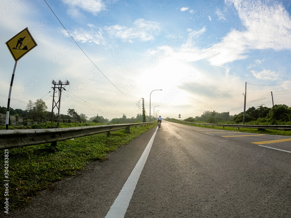 Empty road sunrise