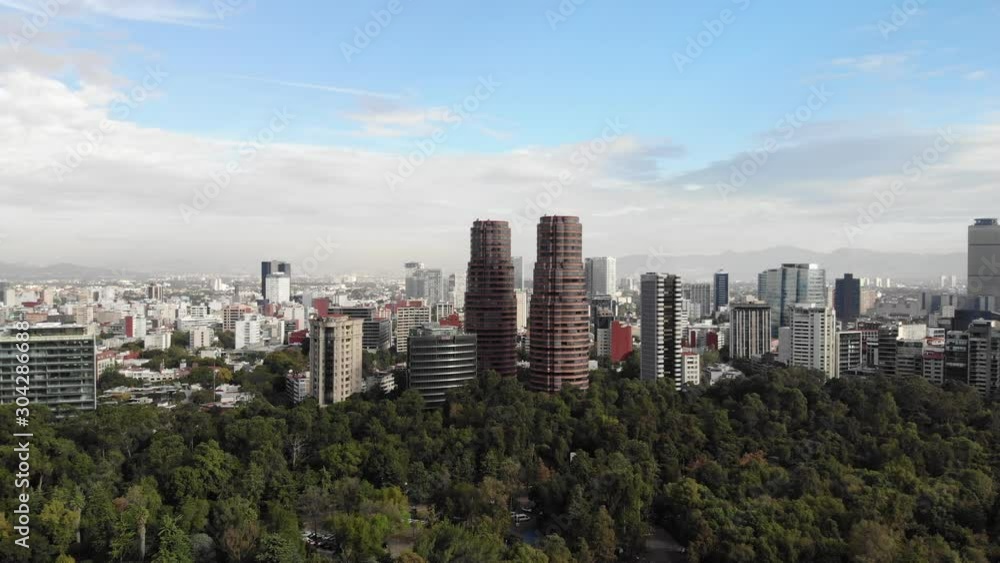 Aerial view of the Polanco Skyline at sunrise. Drone flying forward with a blue and cloudy sky Aerial view of the Polanco Skyline at sunrise. Drone flying forward with a blue and cloudy sky