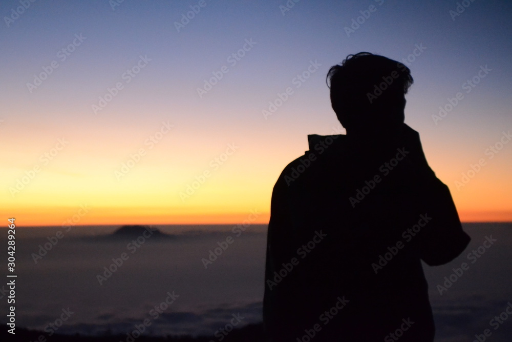 silhouette of a man at sunset