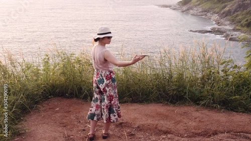 woman on the beach in sunset 