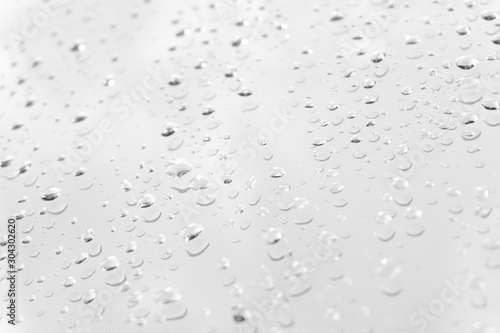 Wallpaper Mural Raindrop water dew drop on glass wet white gray blue background. Torontodigital.ca