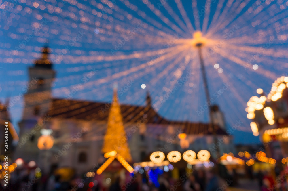 Holidays, sale and retail concept, evening christmas market at old town of Sibiu, Transylvania