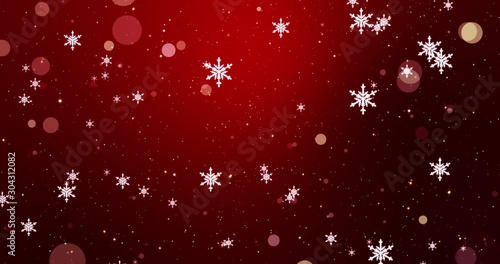 White winter confetti, snowflakes and bokeh lights on the red Christmas background.