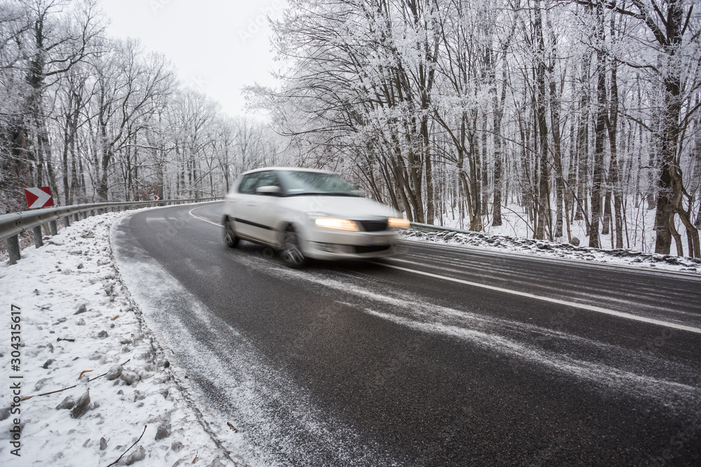 fast car with snowy road at wintertime fast car with snowy road at wintertime