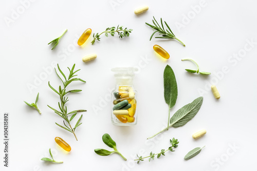 Herbal formulations for health care on white background top view pattern
