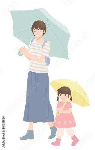 傘をさす親子