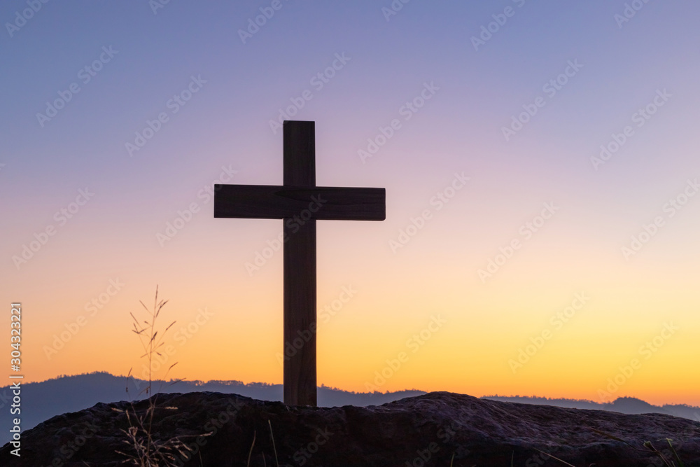 cross crucifixion of the crucifixion of jesus christ on a mountain with a sunset sky background cross crucifixion of the crucifixion of jesus christ on a mountain with a sunset sky background