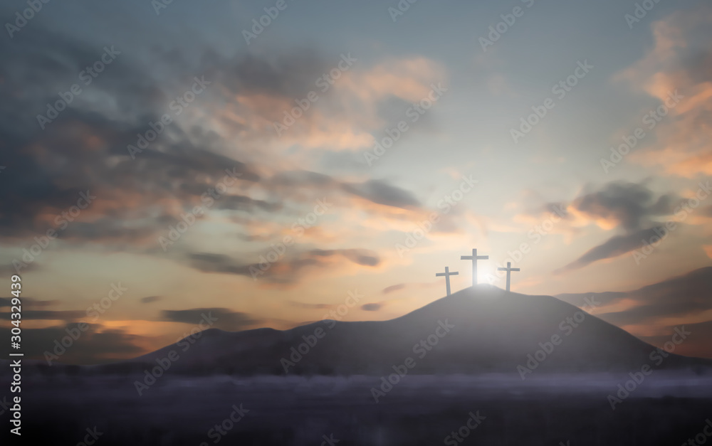 cross the crucifixion on the mountain jesus christ with a sunset background