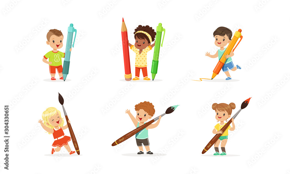 Fototapeta premium Cute Young Children Holding Big Pencils and Pens