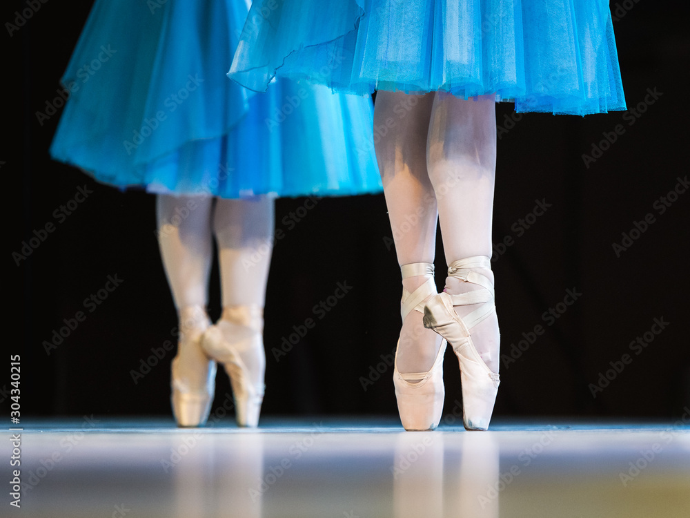 Legs of ballerinas dancing in ballet Swan Lake. Legs of ballerinas dancing in ballet Swan Lake.