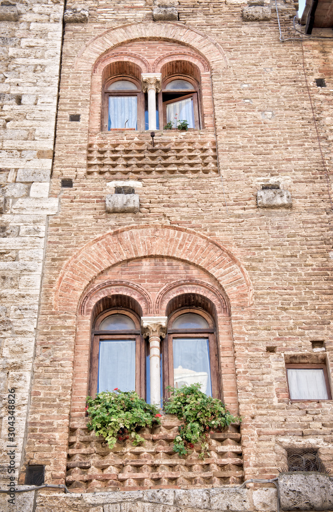 Traditional bifora windows on an ancient building