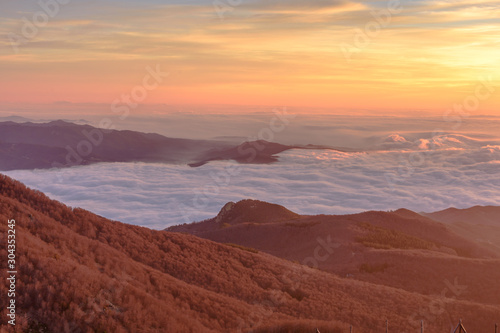 Beautiful sunrise with colored orange sky  Montseny Natural Park  Catalonia  Spain 