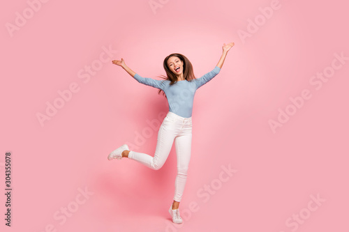Full length body size photo of cheerful positive cute pretty nice girlfriend dancing jumping free isolated pastel color background