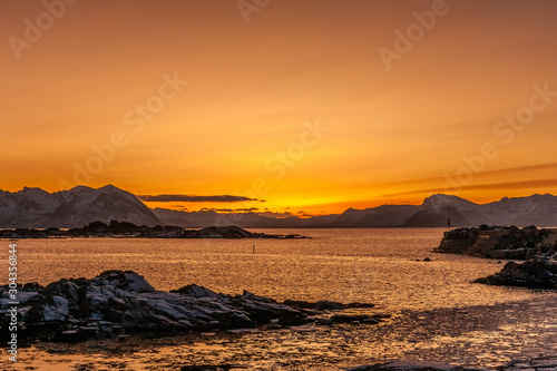 Amazing Sunset over Lofoten island, Norway. Dramatic winter landscape