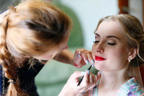Make-up artist doing makeup.Make up