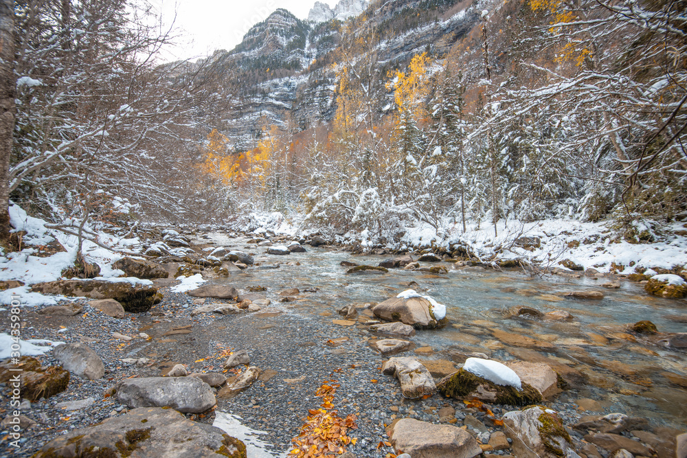 Ordesa National Valley in snowy autumn, located in Pyrenees Spain Ordesa National Valley in snowy autumn, located in Pyrenees Spain