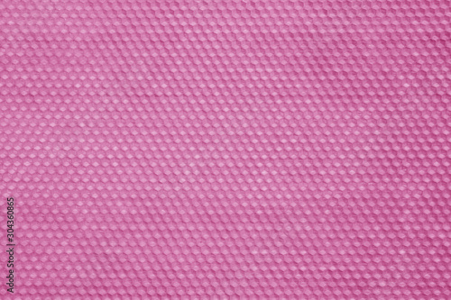 Honeycomb wax texture in pink tone.