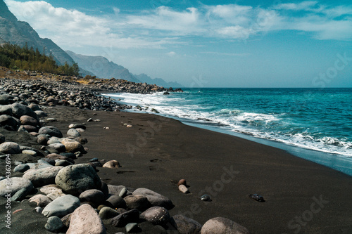 Obraz na plátně View of the black beach Playa de Guayedra  with volcanic boulders in Las Palmas