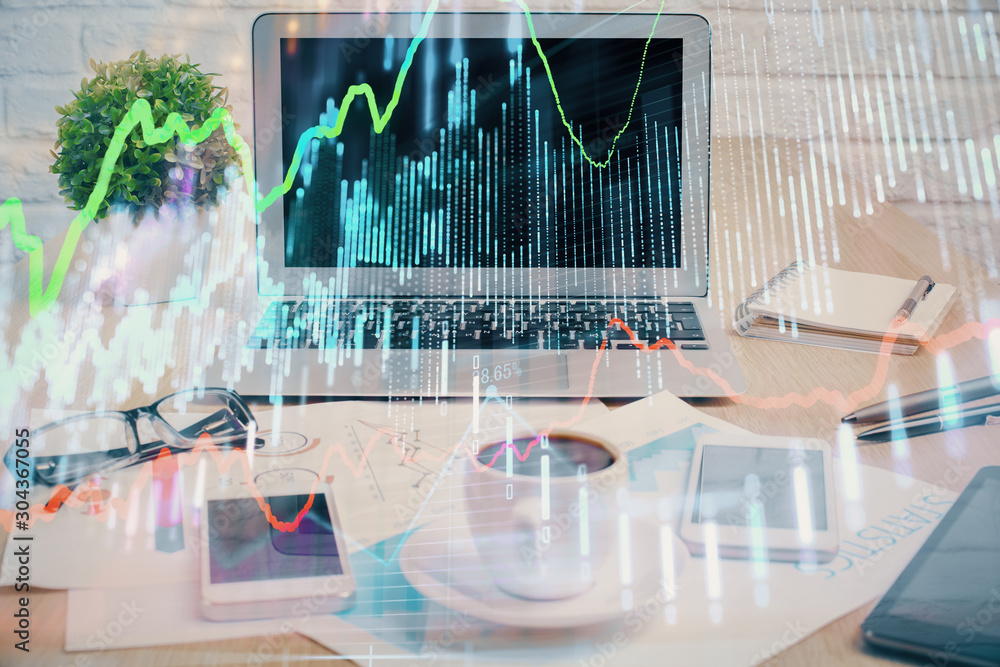 Forex market chart hologram and personal computer background. Double exposure. Concept of investment. Forex market chart hologram and personal computer background. Double exposure. Concept of investment.