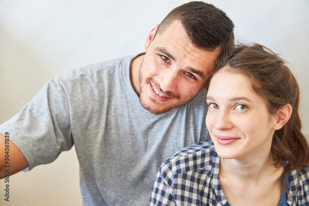 Happy young couple in the new apartment Happy young couple in the new apartment