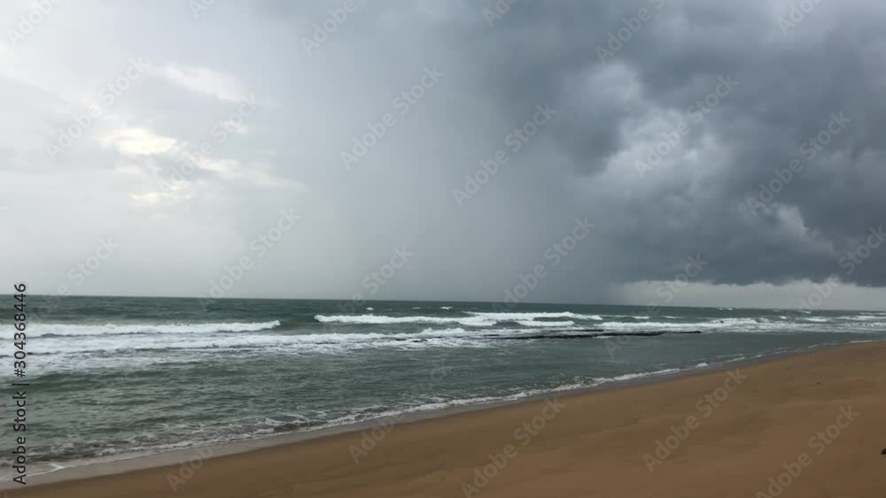 storm rain wind and black cloudy surface the seaside beach and big waves bad weather storm rain wind and black cloudy surface the seaside beach and big waves bad weather