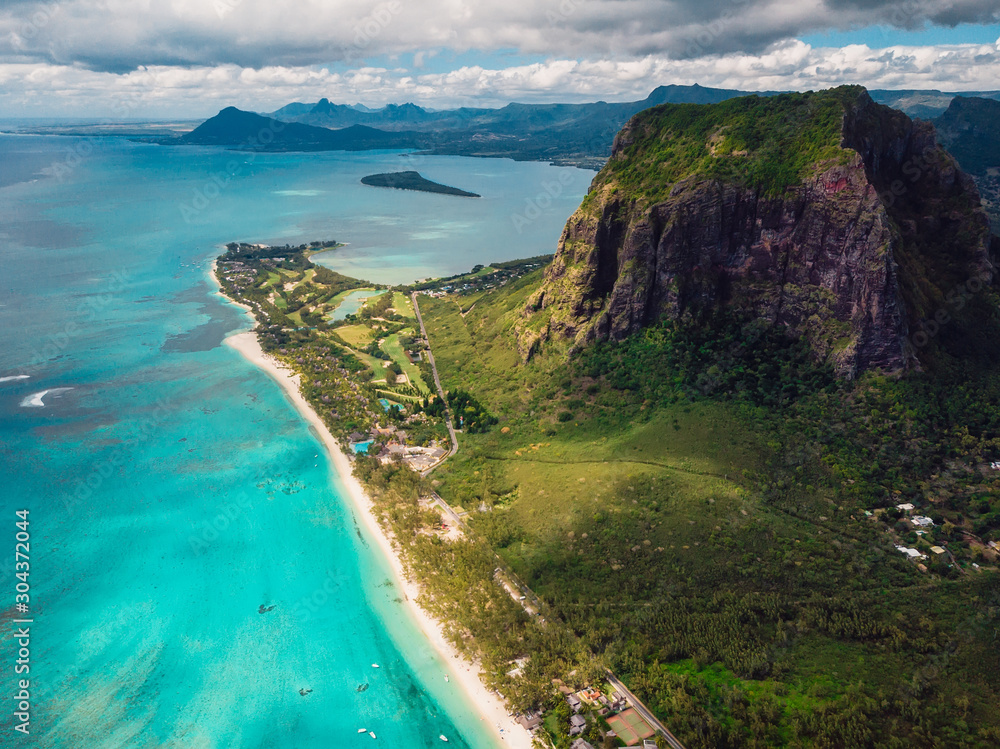 Fototapeta premium Tropical island with Le Morne mountain, blue ocean and beach in Mauritius. Aerial view