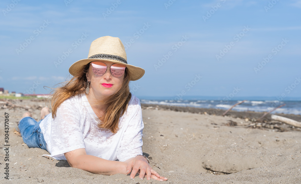beautiful happy woman at the seaside