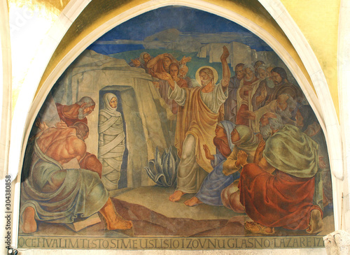 Jesus resurrects Lazarus, fresco in the church of St. Mark in Zagreb, Croatia 