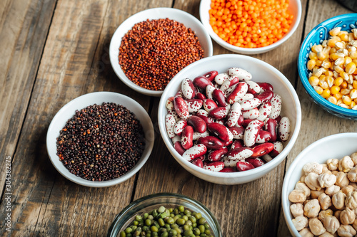 Super food. Seeds and beans assortment on a rustic background copy space. Vegetarians. Top view