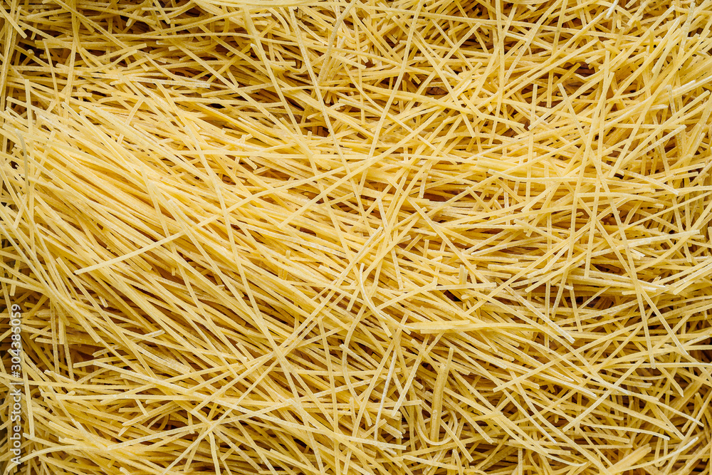 Homemade dry noodles prepared for domestic soup preparation Homemade dry noodles prepared for domestic soup preparation