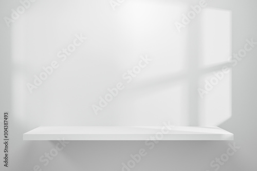 Vászonkép Front view of empty shelf on white table showcase and wall background with natural window light