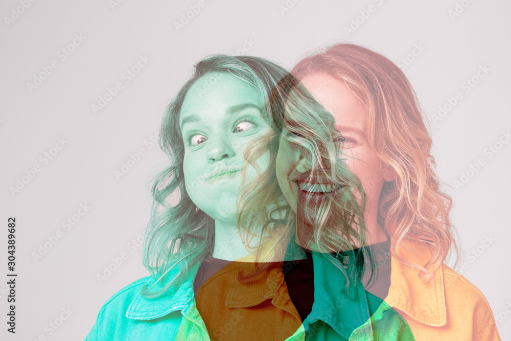 Composite Concept Image Showing Contrasting Emotions On Face Of Young Woman Using Social Media Composite Concept Image Showing Contrasting Emotions On Face Of Young Woman Using Social Media