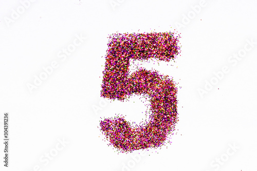 Figure 5 of bright sequins on white background