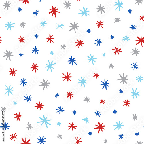 Doodle stars vector pattern in winter, Christmas colors. Hand drawn snowflakes seamless background.