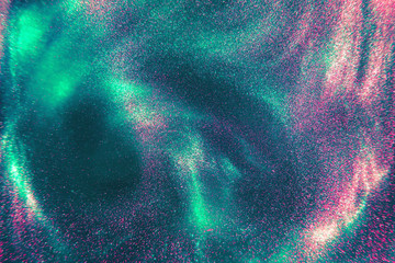 Abstract elegant, trendy detailed mint and pink glitter particles flow with shallow depth of field underwater. Holiday magic shimmering luxury background. Festive sparkles and lights. de-focused.