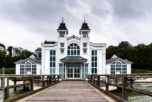 Famous Sellin Seebruecke, Sellin Pier, a cloudy day of summer, Ostseebad Sellin tourist resort, Baltic Sea region, Germany photo