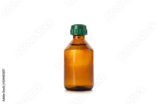 Brown glass medical bottle isolated on white background
