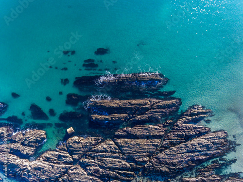 Aerial view of rocks and waves in cornwall